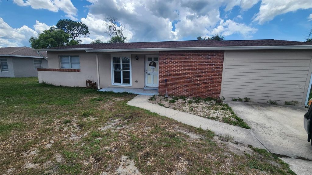 Photo of 1025 Cobblestone Drive, Spring Hill, FL 34606 (MLS # TB8511607)