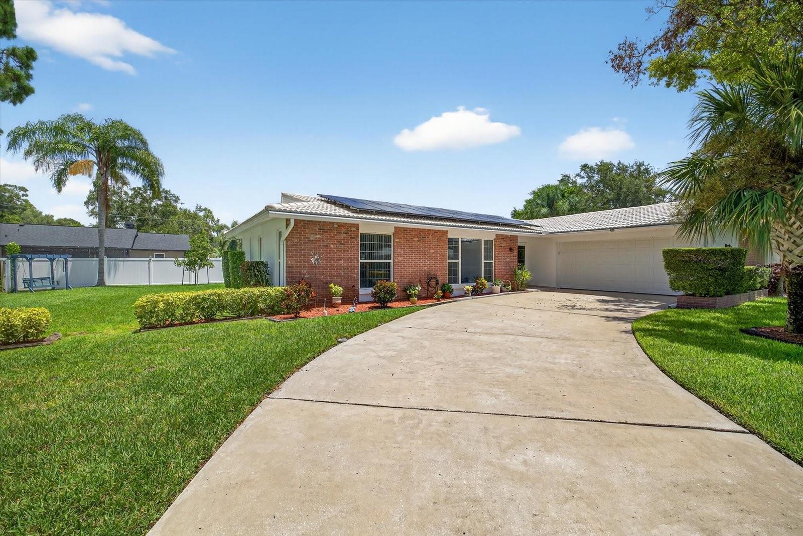 Live the Dunedin Dream — Space, Style & Freedom Just Minutes from Downtown.
Act fast—homes like this rarely hit the market in one of Dunedin’s most sought-after locations! Welcome to 1228 Inverness Drive, where lifestyle meets flexibility. This beautifully updated and impeccably maintained 3-bedroom, 2-bath home offers 1,781 sq ft of living space on a .25-acre lot with no HOA or deed restrictions—a rare opportunity to live life on your terms. Bring your RV, boat, or golf cart, or plan for a future pool or home expansion to accompany the private 4-person spa/hot tub (buyer to verify with the City of Dunedin). Inside, you’ll fall in love with the open-concept kitchen, featuring marble countertops, stainless steel appliances, a modern range hood (installed 1/23), and sleek, contemporary finishes throughout. The split floor plan offers both privacy and functionality—ideal for entertaining, working from home, or enjoying a quiet retreat. The spacious living area opens through pocket sliding glass doors to a screened-in lanai, upgraded with no-see-um mesh screening and vibrant mosaic tile—blending indoor comfort with outdoor charm. Additional upgrades include renovated bathrooms, stylish tilework, and updated exterior screens.This home is also designed with energy efficiency in mind, featuring: Third-party solar panels to lower monthly utility bills. A durable Spanish tile roof built to last.Outdoor solar lighting and LED lighting throughout and reclaimed water for irrigation. The Lifestyle You Deserve. Located just minutes from Downtown Dunedin, located in flood zone x, you’ll have quick access to: Charming restaurants, breweries, and year-round festivals, The sugar-white sands of Honeymoon Island, Highlander Park & Aquatic Complex, The inspiring Dunedin Fine Arts Center And the historic Dunedin Golf Club, with golf cart accessibility (buyer to confirm with City). This isn’t just a home—it’s a chance to live in one of Florida’s most vibrant, welcoming coastal communities, with space to grow, entertain, and unwind.Opportunities like this don’t last long—schedule your private showing today before it’s gone!
