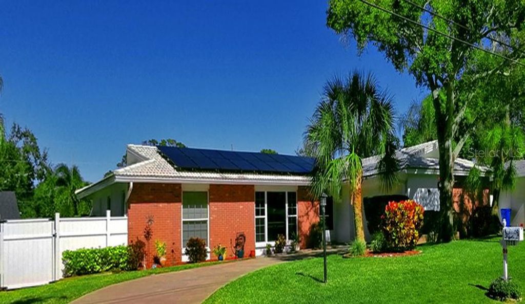 Photo of 1228 Inverness Drive, Dunedin, FL 34698 (MLS # TB8411917)