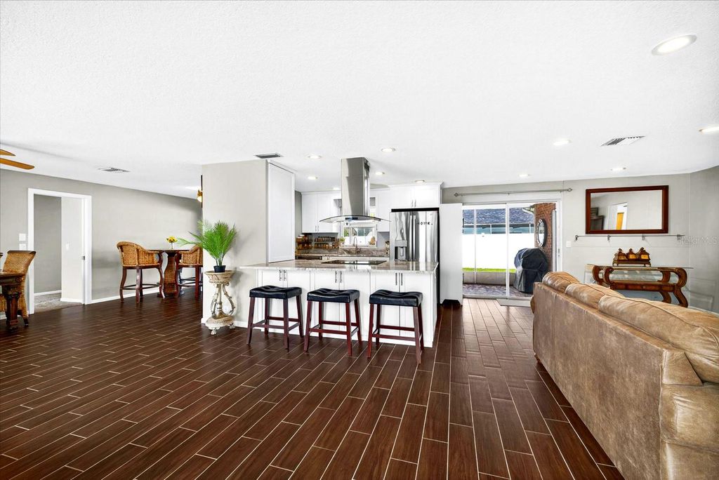 Photo of 1228 Inverness Drive, Dunedin, FL 34698 (MLS # TB8411917)