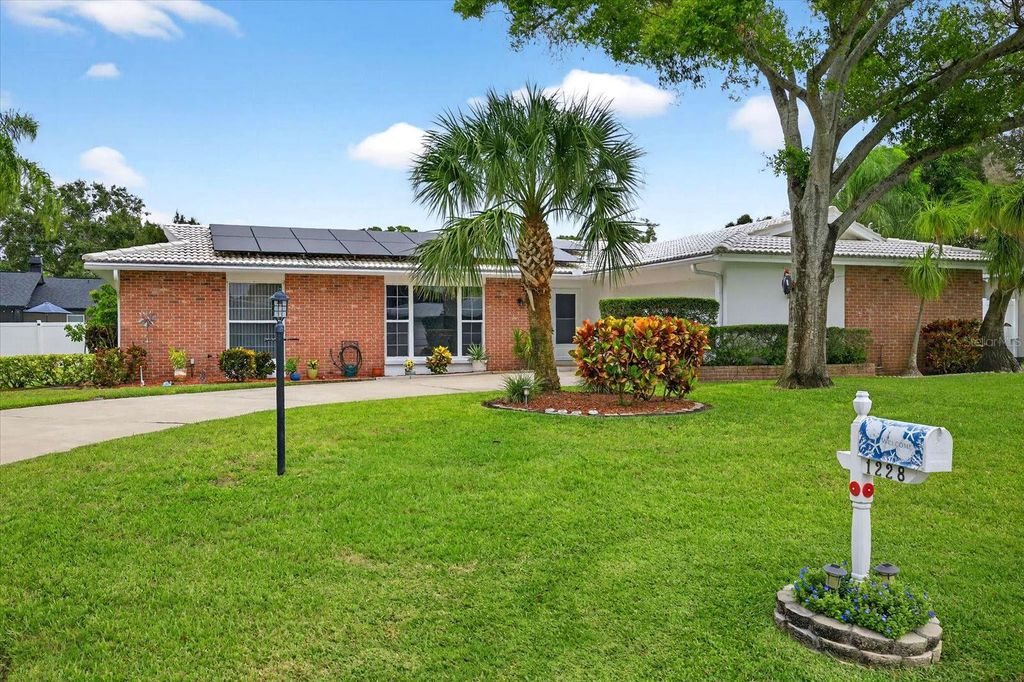 Photo of 1228 Inverness Drive, Dunedin, FL 34698 (MLS # TB8411917)