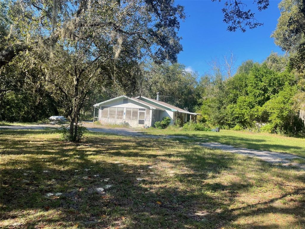 Photo of 11428 Tenoaks Drive, Hudson, FL 34669 (MLS # TB8440663)