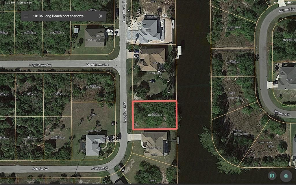 Photo of 10136 LONGBEACH STREET, PORT CHARLOTTE, FL 33981 (MLS # A4559068)