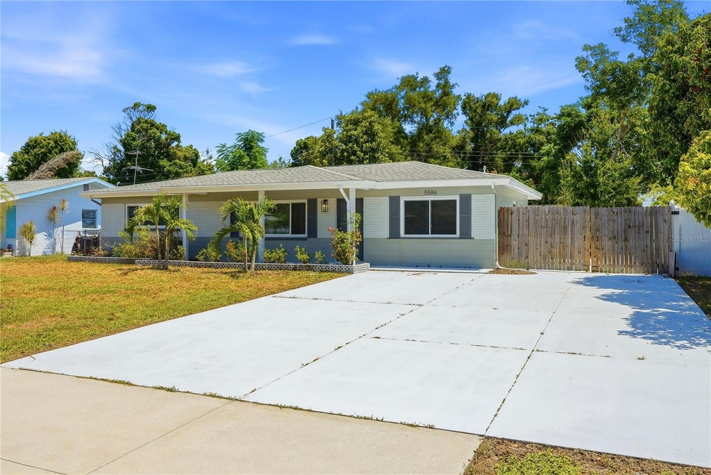 Photo of 5586 30th Avenue N, St Petersburg, FL 33710 (MLS # TB8518396)