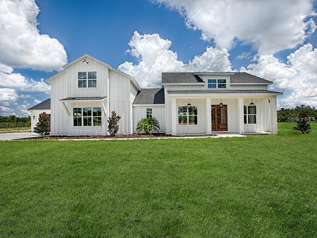 Photo of 23 Lakeshore Drive, Mount Dora, FL 32757 (MLS # G5118086)