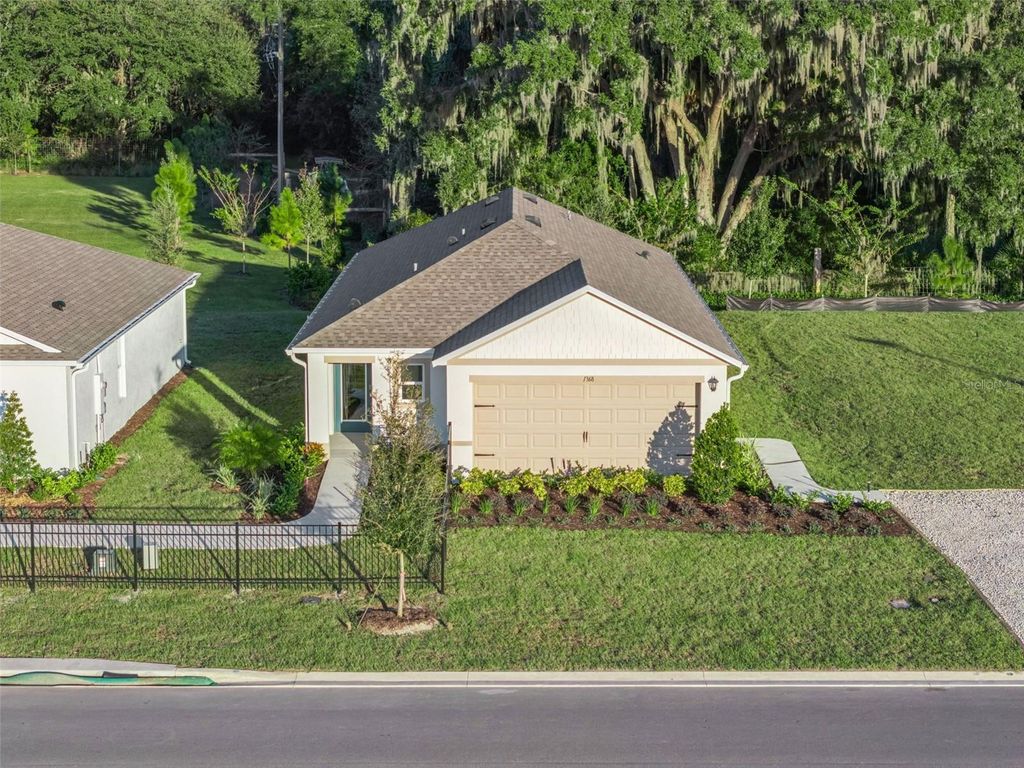 Photo of 3417 Nettle Loop, Tavares, FL 32778 (MLS # O6363332)