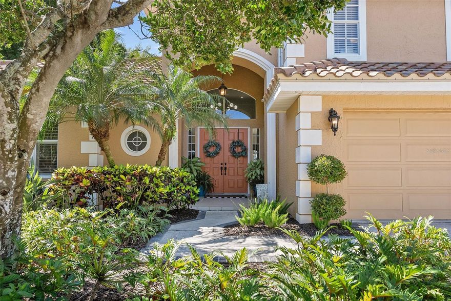 DREAM OPPORTUNITY! Over 9 feet base elevation with low assumable flood insurance ($1,082/yr). This is the one you've been dreaming of. Soaring ceilings, jaw dropping kitchen, incredible layout, 3 car garage with Tesla charging station and solar energy which means low cost energy bills under $100 per month! Can't beat that for a home of this size. 5 bedrooms, 4.5 bathrooms, oh and did we mention it's a WATERFRONT property with a 13k boat lift and access to Tampa Bay?! Now that we have your attention, keep reading there's so much to be said about this truly unique property. Located behind the gated neighborhood of Placido Bayou you will find one of St Petersburg's best kept secrets. Lush and tropical neighborhood with sidewalks, lakes, and neighbors out and about enjoying the sunshine. One of only 26 truly waterfront homes on the tree lined dead-end street. This elegant executive styled home boasts cathedral ceilings, and generous living spaces that all open up to the backyard and patio. Primary retreat is exceptional with many closets including an enviable walk-in, en-suite bathroom with soaking tub, walk-in shower, dual vanities and plenty of space to add your own touch. There are two additional bedrooms and two full bathrooms located on the main level of this home. The central hub of all homes, this kitchen is unreal! Gorgeous marble countertops, custom cabinetry, and all the appliances you could need. New 48-inch dual-fuel pro range with double ovens, gas range, induction cooktop, and built-in Sous Vide! Built-in Miele coffee machine, wine/beverage cooler, ice maker, and a custom ladder to reach the plethora of storage. Walk-in pantry storage. Eating space in the kitchen, and Family room are all located off of the kitchen. Second floor features a loft area, two very large bedrooms connected with a full bathroom and each has its own sink, vanity, and toilet. The entire rear of the home opens up to the patio/pool area that is perfect for Florida lifestyle entertaining. Outdoor gas grill, room for dining, and lounging. Pool with spillover spa. Riprap barrier and large dock with a 13k boat lift. Tesla solar panels and 3 backup powerwalls that allow the home to run on battery and store the energy created from the solar panels. Tesla charging station ready for your electric vehicle. Easy water access to Tampa Bay. 10 minutes to Downtown St Petersburg, 20 minutes to the Tampa Bridges, and 25 minutes to our World famous white sandy Beaches. Come see why so many choose to call Placido Bayou home.