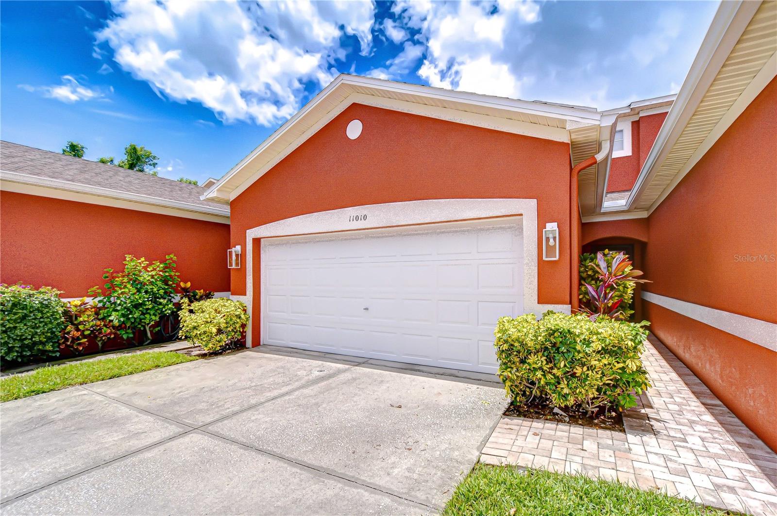 Welcome to this meticulously maintained 2-bedroom, 2.5-bathroom townhome with a spacious 2-car garage, perfectly situated in the sought-after Casa Blanca community of Westchase. Enjoy peace of mind with a new roof replaced in 2023 and a recently installed, high-efficiency HVAC system, ensuring year-round comfort and energy savings. The heart of the home is the stylish kitchen, featuring sleek granite countertops, a designer tile backsplash, and stainless-steel appliances—ideal for the home chef. You’ll also appreciate the recently installed high-end water softener, providing pure, softened water throughout the home. On the first floor, a generously sized office with elegant French doors and a private half bath offers the perfect space for productivity or creativity. Upstairs, you’ll find two well-appointed bedrooms, each with its own full bathroom for ultimate privacy and convenience. The primary suite is a true retreat, highlighted by large windows, an updated bathroom with dual vanities, modern glass bowl sinks, a brand new, beautifully replaced shower, and a spacious walk-in closet. Plush, brand new carpeting graces the stairs and upper level, providing comfort and a fresh feel throughout. Step outside to your fully fenced backyard—perfect for gardening, play, or creating your own outdoor oasis. The Casa Blanca community offers a scenic walking trail, tranquil pond, and a sparkling community pool for your enjoyment. All of this is just minutes from the vibrant Westchase area, with easy access to local dining, entertainment, shopping, top-rated schools, and only a 15-minute drive to Tampa International Airport. Don’t miss your chance to make this exceptional townhome your own—schedule your private showing today!