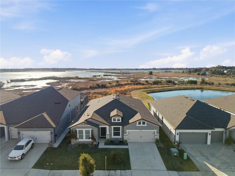 Photo of 9539 Ibis Grove Boulevard, Wesley Chapel, FL 33545 (MLS # TB8472033)