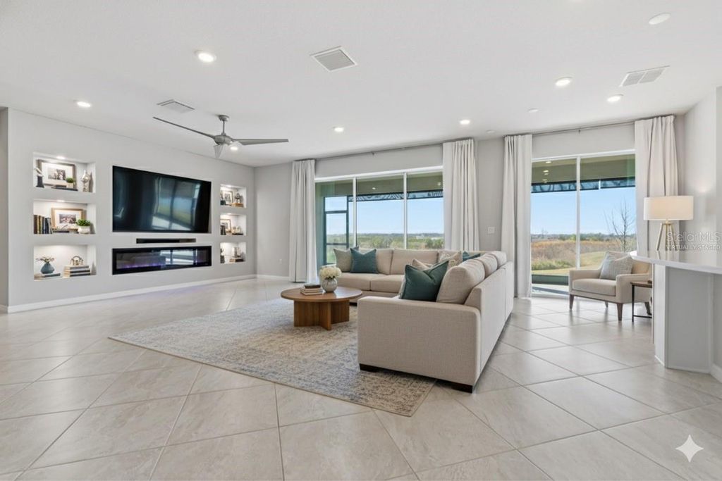 Photo of 9539 Ibis Grove Boulevard, Wesley Chapel, FL 33545 (MLS # TB8472033)