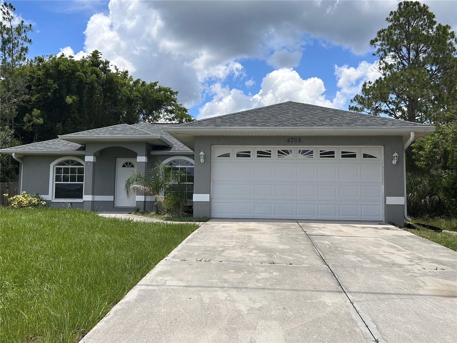 Welcome to this beautifully maintained 3-bedroom, 2-bath single-family home located in the heart of North Port. Situated on an oversized lot with a fully fenced backyard, this property offers privacy and space for outdoor enjoyment. Built in 1997 with solid concrete block construction, this home features an open split-bedroom floor plan, ceramic tile flooring throughout, and a spacious kitchen perfect for entertaining. Enjoy the convenience of a 2-car garage, public water and sewer, and no HOA or deed restrictions. Located near shopping, dining, schools, and with easy access to I-75. Don’t miss this opportunity to own a move-in ready home in a growing community.