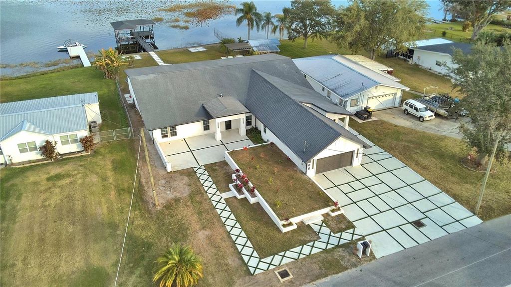 Photo of 906 Lake Jessie Drive, Winter Haven, FL 33881 (MLS # L4957757)