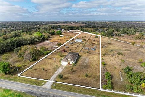 Photo of 13710 Golf Course Road, Parrish, FL 34219 (MLS # A4680111)