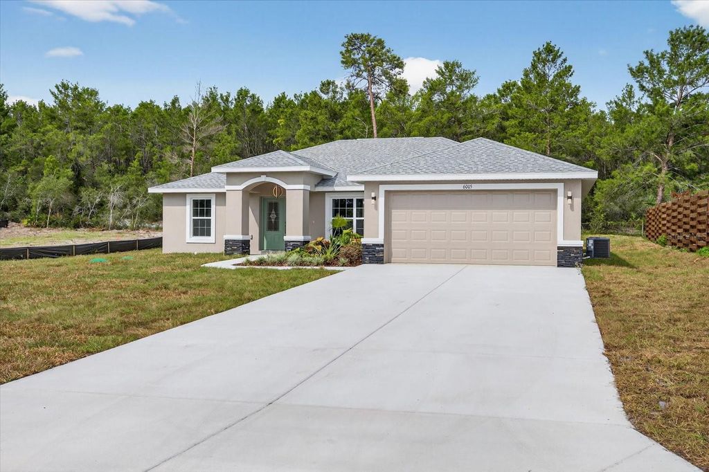 Photo of 6005 Moongate Road, Spring Hill, FL 34606 (MLS # TB8428973)