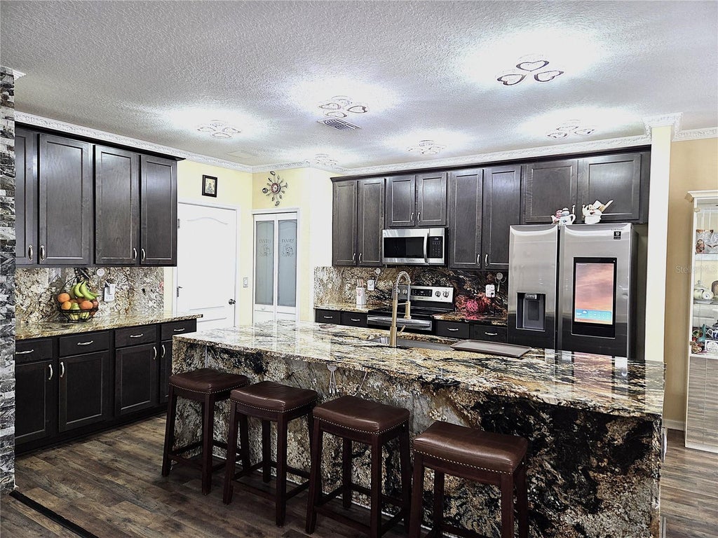 Photo of 4529 Reisswood Loop, Palmetto, FL 34221 (MLS # TB8549059)