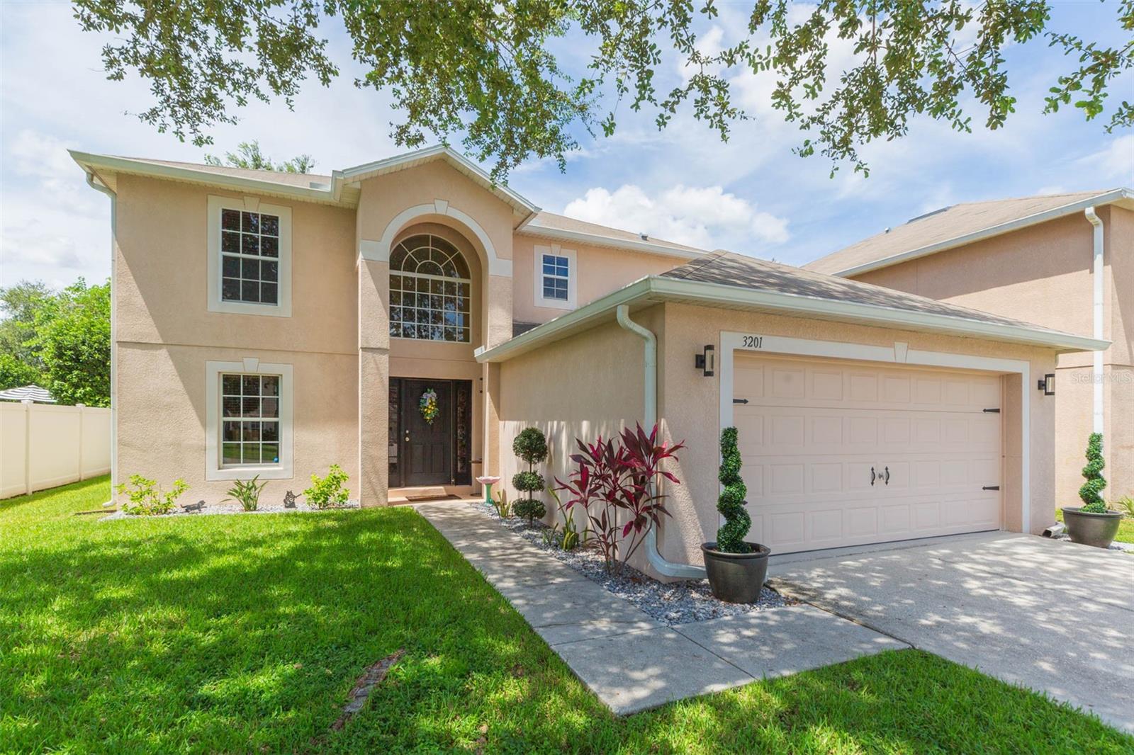 Welcome to Your Pond-Front Oasis in Land O' Lakes! This beautifully maintained 2 story home features 3 spacious bedrooms, 2.5 bathrooms, and a 2-car garage, perfectly located in the highly desirable Suncoast Pointe Villages community. Step inside to an inviting open floor plan that seamlessly connects the living, dining, and kitchen areas, ideal for entertaining or everyday living. Enjoy tranquil pond views from nearly every room, including all bedrooms! The master suite is a true retreat, offering stunning water views, a garden-style soaking tub, a separate walk-in shower, and a large walk-in closet. Each secondary bedroom is generously sized and also features serene pond views. Outdoors, enjoy peaceful mornings or relaxing evenings overlooking the pond frontage, a perfect backdrop for Florida living. Community amenities include a playfield and low HOA, all just minutes from the Suncoast Parkway, major highways, downtown Tampa, Tampa International Airport, and the Gulf beaches. Don’t miss this rare opportunity to own a well-kept home in a prime location with picture perfect water views. Schedule your showing today!