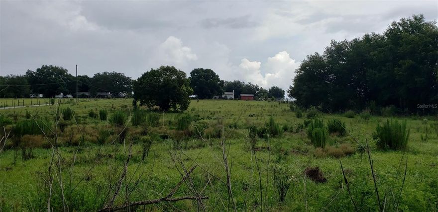 This 5 acre tract is inside the new Apopka Villages commercial district for the corner of Kelly Park and Plymouth Sorrento. Value is in the land. The property is 235" wide and 936' Deep. It is located 1,300 feet north of the intersection where a new Publix is Located. The new commercial area will be a mix of Offices and Retail. Only 1/2 mile East on Kelly Park to the access ramp of SR 429. Please note that there is an existing 24 month lease starting April 1, 2021 in place. Annexation into the City of Apopka has been completed. Terms available with the seller. Note that the adjacent 5 Acre to the north is available also.