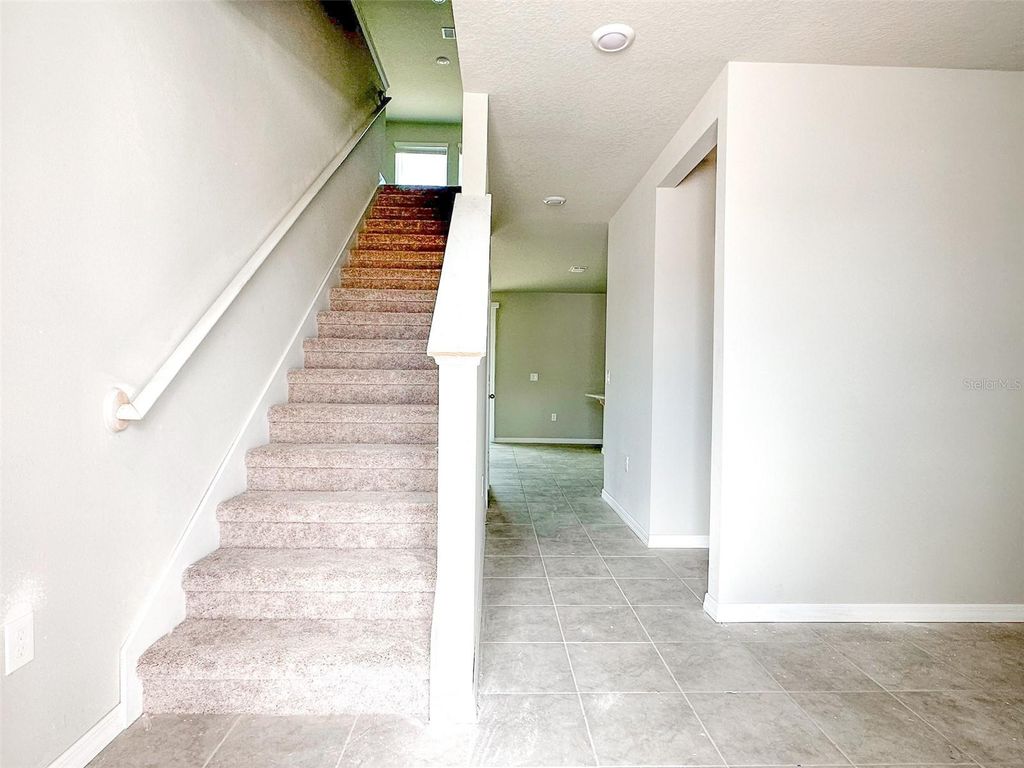 Photo of 484 Sun Warbler Way, Saint Cloud, FL 34771 (MLS # O6393260)