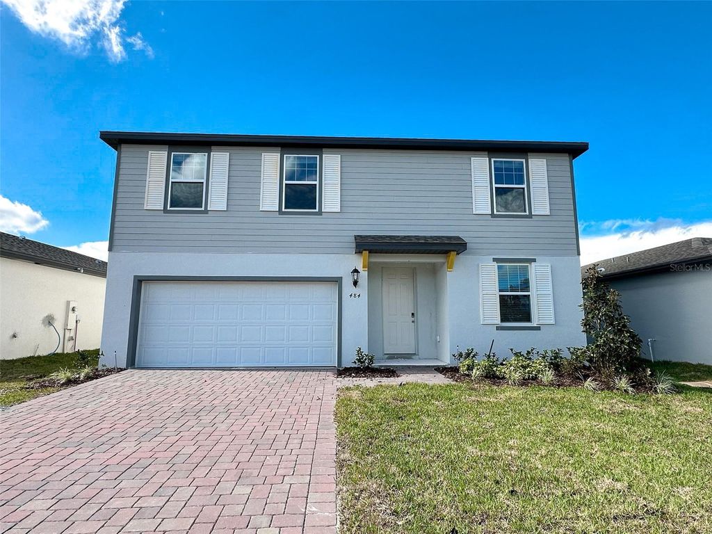 Photo of 484 Sun Warbler Way, Saint Cloud, FL 34771 (MLS # O6393260)