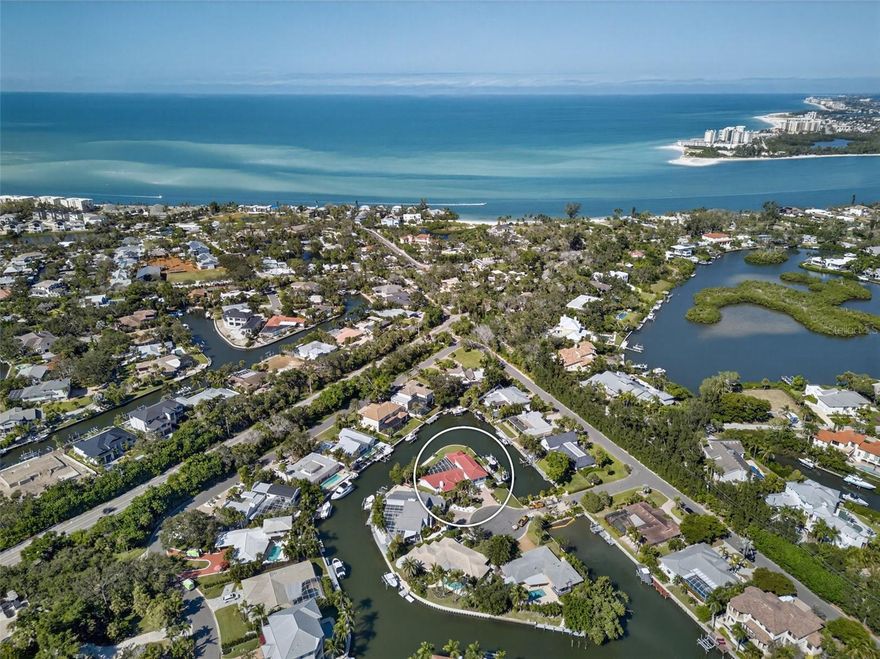 Boater’s Dream on Siesta Key! Experience the ultimate waterfront lifestyle in this beautifully renovated Siesta Key home, offering an extraordinary 268 feet of waterfront and immediate access to the Intracoastal Waterway. No bridges to the bay. This is truly a boater’s paradise, complete with a private dock featuring two lifts, perfect for accommodating your vessels and exploring the surrounding waters, from a quick cruise to Skiers Island for water sports, to sunset sails on the Gulf of Mexico. Recently and thoughtfully renovated, this stunning coastal residence perfectly blends timeless design with modern luxury. Boasting five spacious bedrooms, four and a half bathrooms, and 4,201 square feet of refined living space, it offers the ideal setting for relaxed everyday living and effortless entertaining. All within a home designed to complement today’s vibrant family lifestyle. Step inside to discover a light-filled, open floor plan framed by tranquil water views. New flooring and stylish fixtures create a crisp, inviting ambiance. The kitchen blends form and function with stainless steel appliances, custom cabinetry, quartz countertops, and a spacious island ideal for gathering with family and friends. The primary suite is a serene retreat featuring a spa-inspired bath and direct access to the pool terrace. Outdoor living shines with multiple spaces for lounging and dining beside the pool or enjoying the expansive waterfront lawn. Located on the north end of Siesta Key, just minutes off the island via the North Bridge and close to Siesta Key Village and the island’s world-famous white-sand beach. This property combines the best of island living and boating convenience, all in one exceptional address.