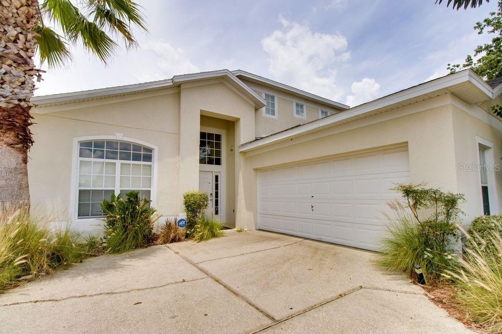 Photo of 730 Bloomingdale Dr, Davenport, FL 33897 (MLS # A4689322)