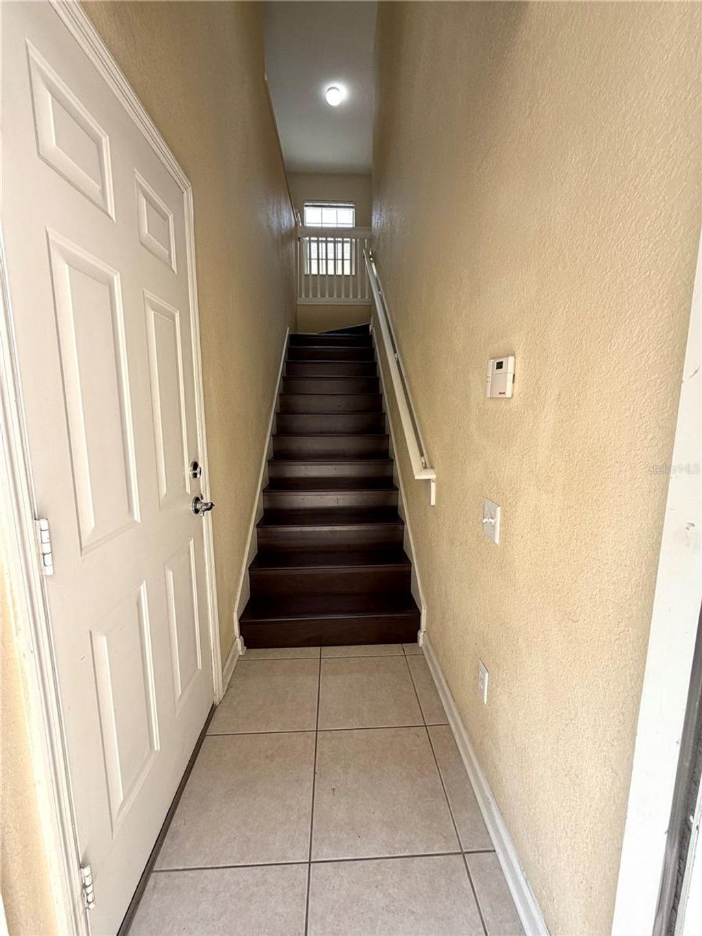 Photo of 6425 Agastia Court #104, Orlando, FL 32835 (MLS # O6395192)