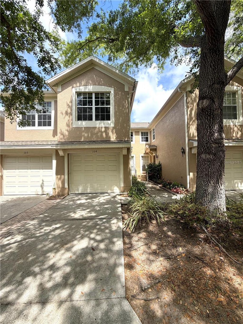 Photo of 6425 Agastia Court #104, Orlando, FL 32835 (MLS # O6395192)
