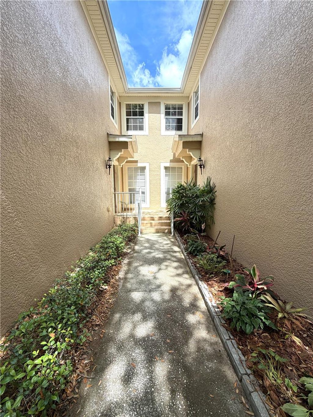 Photo of 6425 Agastia Court #104, Orlando, FL 32835 (MLS # O6395192)