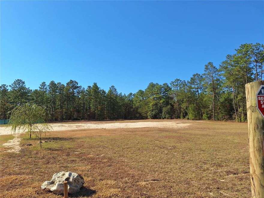 Discover the perfect blend of country living within a quiet community tucked amidst some of the prettiest land in Marion County. This large lot has been cleared and leveled and is ready to get started on the home of your dreams. No HOA and not in a flood zone. Per the county zoned for site built homes only. No mobile homes. Located only 11 miles from the esteemed World Equestrian Center for world-class horse events as well as other year round festivals and shows and 15 minutes to beautiful Rainbow Springs State Park for your outdoor adventures. If saltwater fishing is your thing, the Gulf of Mexico is a short 30 minute drive. Find your builder and get started on your dream home today!