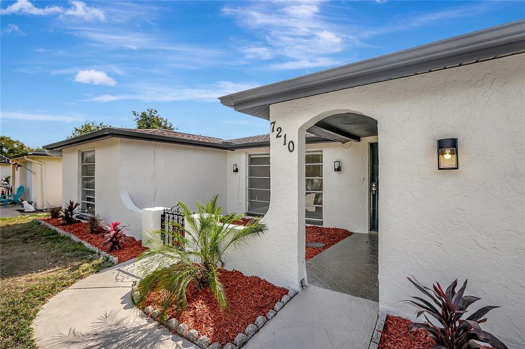 Photo of 7210 Parrot Drive, Port Richey, FL 34668 (MLS # TB8453659)