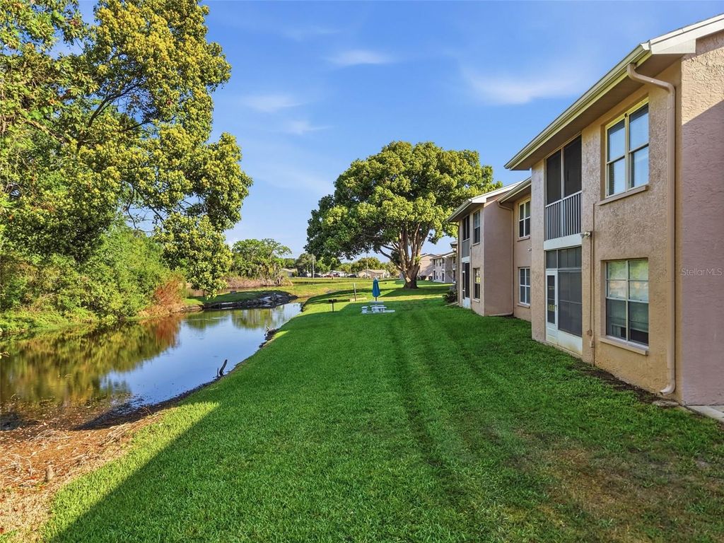 Photo of 4833 Myrtle Oak Drive #12, New Port Richey, FL 34653 (MLS # TB8490690)