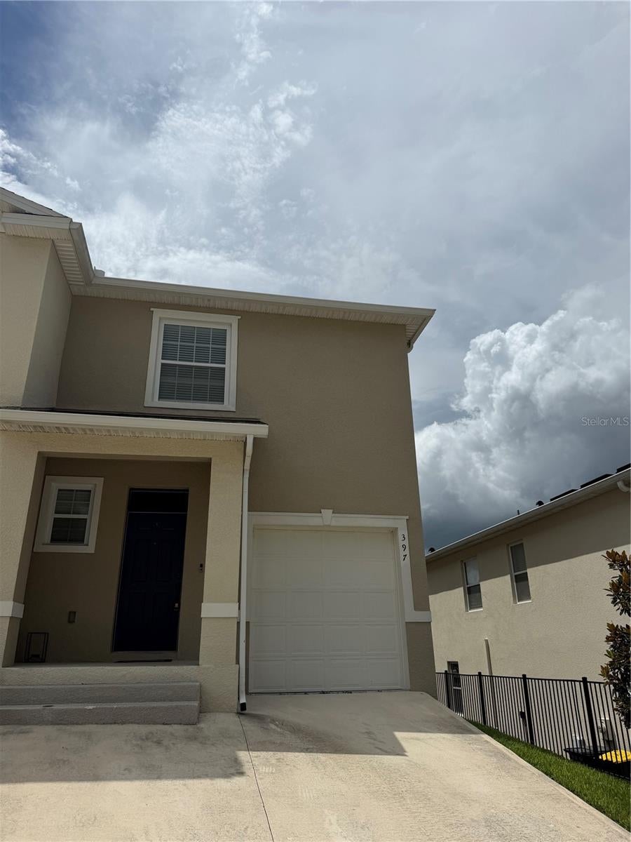 Photo of 397 Feltrim Reserve Boulevard, Davenport, FL 33837 (MLS # S5156942)