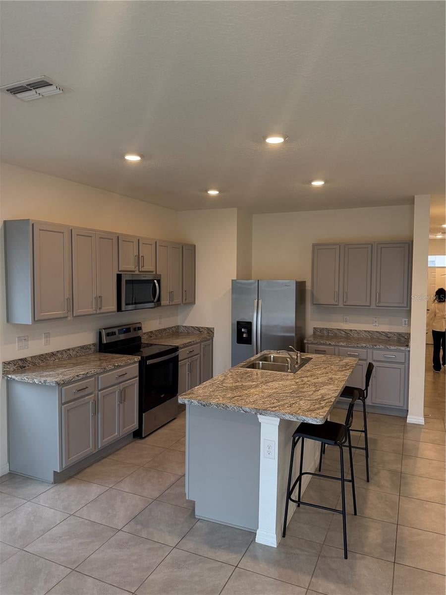 Photo of 397 Feltrim Reserve Boulevard, Davenport, FL 33837 (MLS # S5156942)