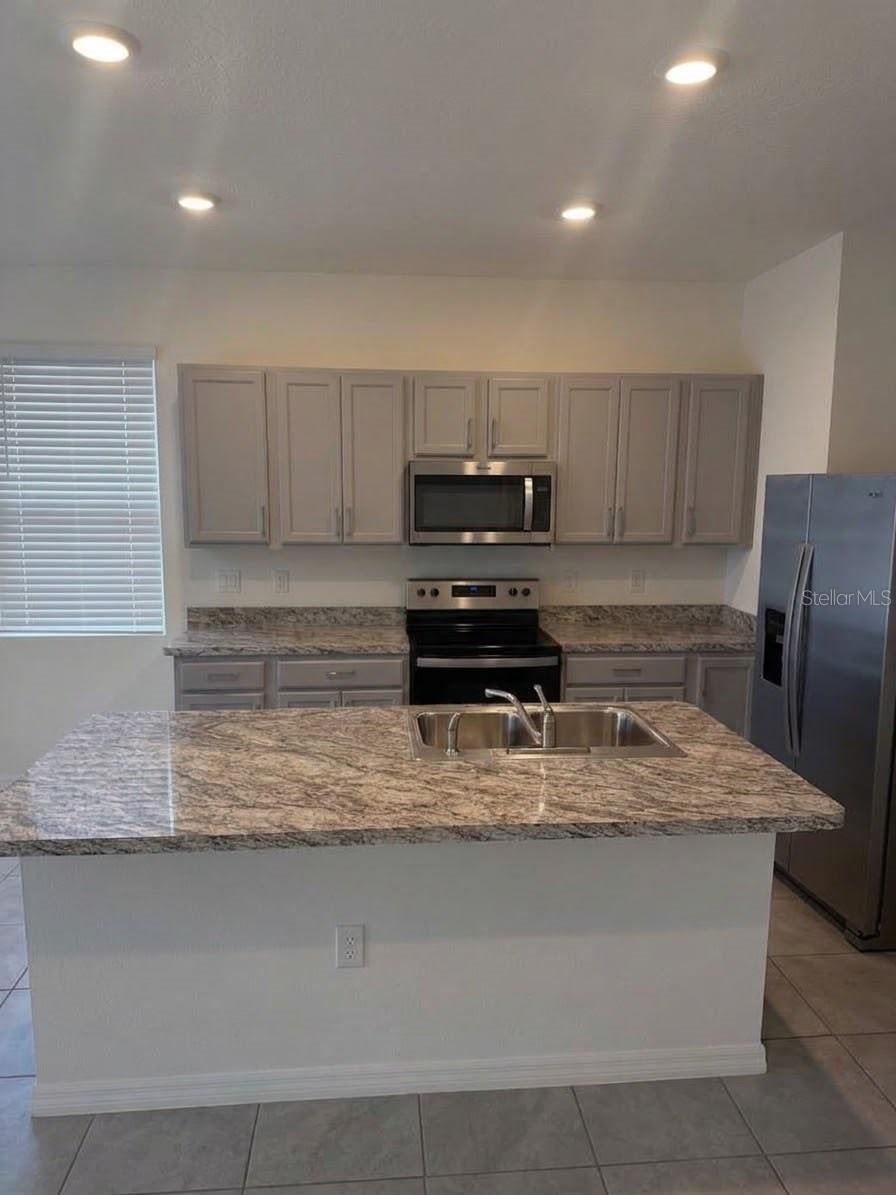 Photo of 397 Feltrim Reserve Boulevard, Davenport, FL 33837 (MLS # S5156942)