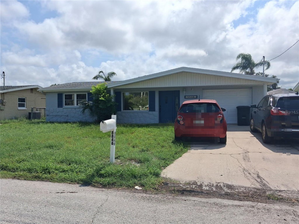 Photo of 8846 Chilton Drive, Port Richey, FL 34668 (MLS # W7889333)