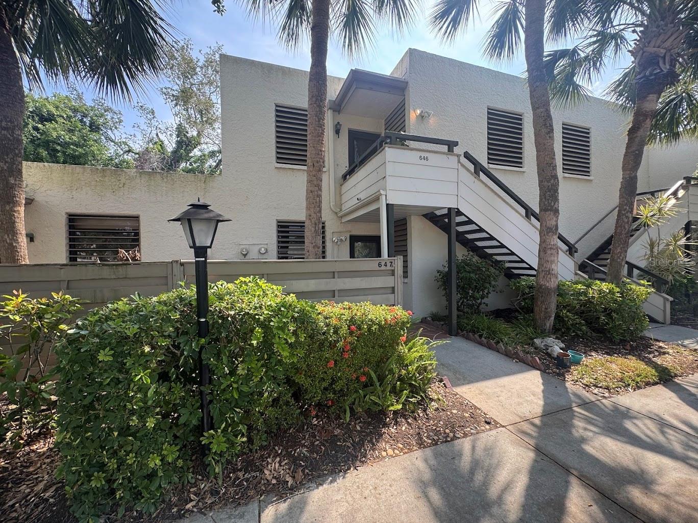 SAME GREAT HOME, NEW LOWER PRICE!! Welcome home to this spot that is nestled in the luscious, landscaped community of Wildewood Springs. You are located just 15 minutes from the white sandy beaches or right around the corner from all the conveniences of life, restaurants, shopping, and entertainment. This well thought out layout gives you plenty of space to make your own. Upon entering you will be greeted by a large kitchen perfect for making home cooked meals. Each of the two bedrooms give off a warm, inviting feel, with generous space and storage that make it easy to settle in and stay awhile. Step out back into your enclosed lanai that you can use all year round while watching the wildlife in the lawn or along the edges of the pond. Or if you want to enjoy the outdoors you can relax with a cold beverage on your front patio that is large enough for entertaining. Did you know that Wildewood Springs is an official Bird Sanctuary? This will become obvious when you take a walk, ride your bike or go for a jog around the 88 acres of nature located in the heart of Bradenton. Wildewood Springs has a calendar of events, several community pools, tennis & Pickleball courts, lots more. AC 2022 & Deeded Carport!