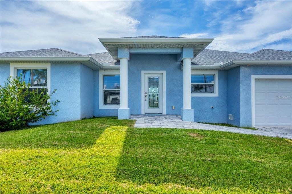Photo of 15483 Mccomb Circle, Port Charlotte, FL 33981 (MLS # D6143766)
