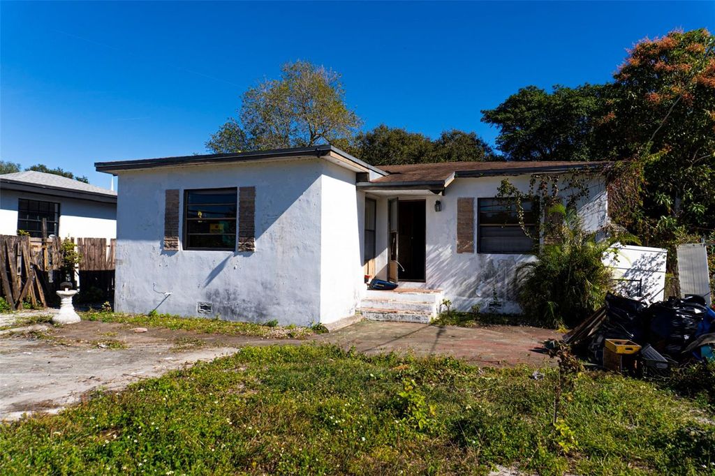 Photo of 18143 NW 20th Avenue, Miami Gardens, FL 33056 (MLS # OM716043)