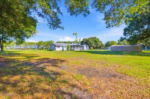 Photo of 6709 Five Acre Rd, Plant City, FL 33565 (MLS # TB8525344)