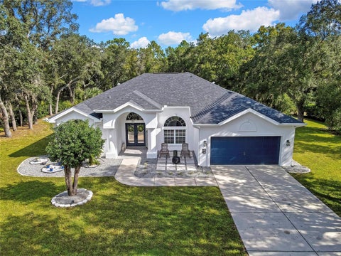 Photo of 83 Oak Village Boulevard S, Homosassa, FL 34446 (MLS # TB8553802)