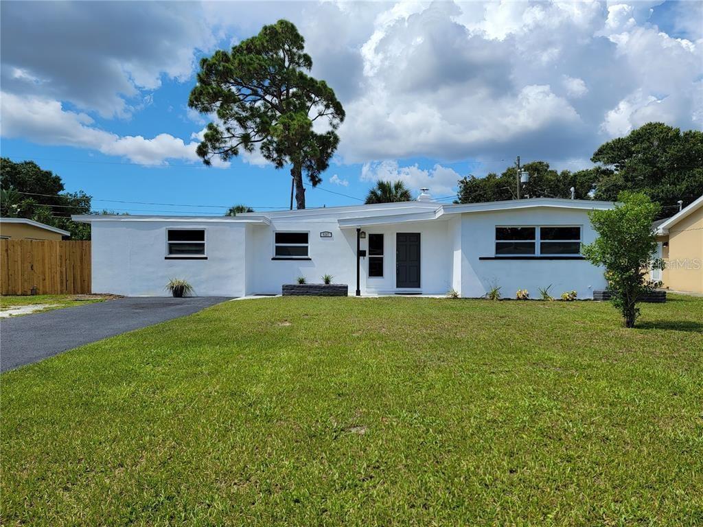 Come see this renovated home short distance to Tyrone shops and 10 mins drive from the nearby beach of your choice. Upon entering you will notice the luxury vinyl flooring, bright and airy living spaces with new paint throughout. The kitchen includes Quartz countertops, a bar-top space for eating, a window overlooking the front yard, and all stainless-steel appliances. The 1st and 2nd bedrooms are both of generous size with easy access to the main bathroom, which has been updated with a new tub, toilet, tile and vanity. 3rd bedroom is flexible can be used as a room providing access to the interior laundry. Additional features include new roof (2022), newer AC and large driveway that can easily park 3 to 4 vehicles. Backyard is fenced and shared with Unit B. This unit is under 1 mile to Tyrone Mall, 4.5 Miles to Treasure Island beach, 1 Mile to Pinellas Trail Access, and under 1 mile to Publix. Come see this home today for your best Florida living.