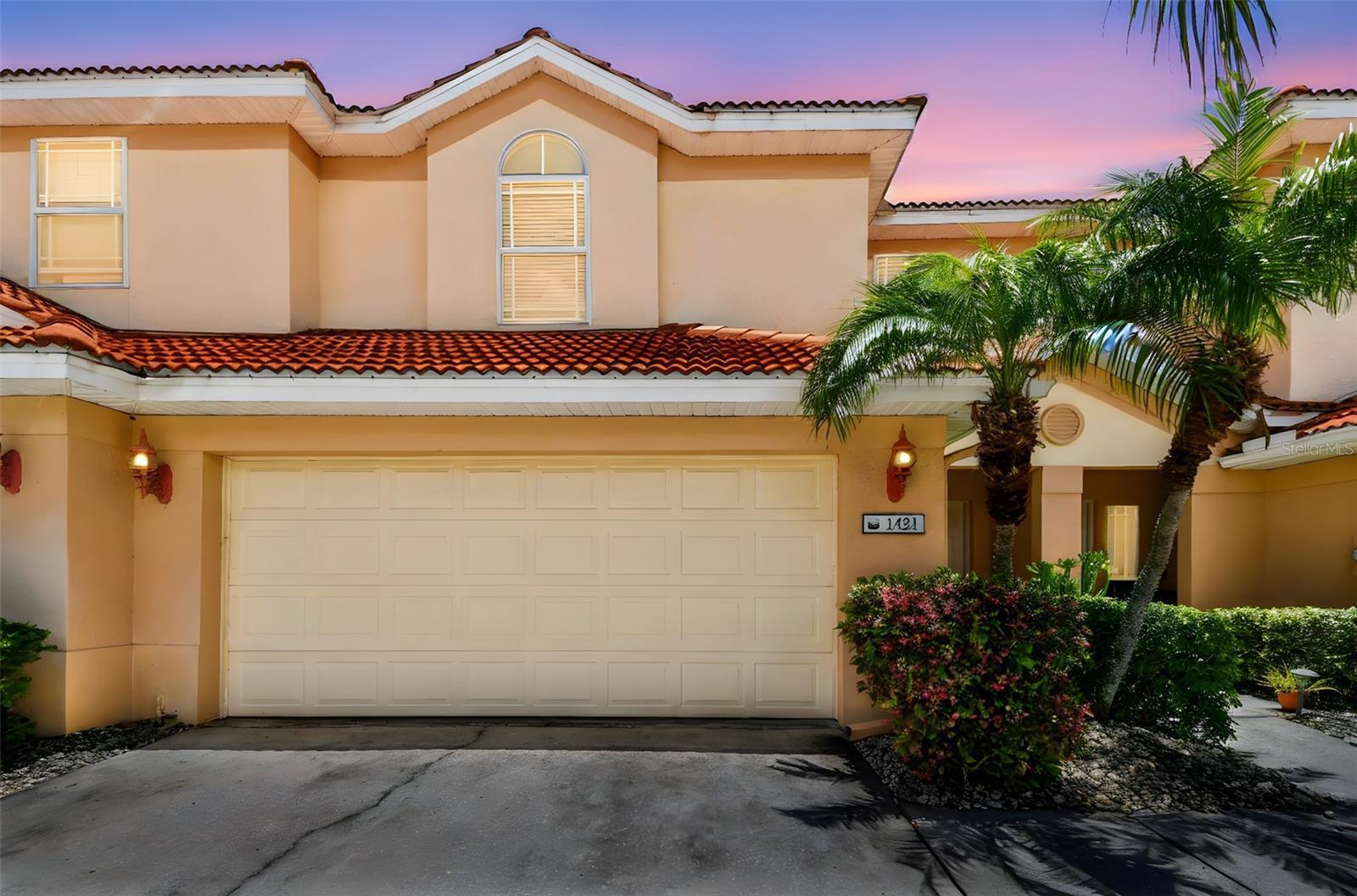 Welcome to this stunning three-bedroom, 2.5-bath townhome in the heart of beautiful Tarpon Springs. Boasting 1,881 square feet of thoughtfully designed living space, this home features tall ceilings, elegant crown molding and a bright open floor plan for entertaining. The gourmet kitchen is a chef’s dream with 42-inch cabinets, granite countertops, stainless steel appliances, a breakfast bar, and plenty of room to cook and gather. Just off the kitchen, the spacious living and dining areas create an inviting space for family and friends. Upstairs, the luxurious primary suite offers a spa-like en suite with double sinks, a soaking tub, walk-in shower and a large walk-in closet. Two generously sized guest bedrooms, each with its own walk-in closet, are on the second floor along with a large loft and a second full bath. The laundry room is also conveniently upstairs. Enjoy the safety of a built-in fire sprinkler system, a new air conditioner (2021) and a spacious two-car garage. With a low $320/month HOA, this home is just minutes from Sunset Beach, scenic Pinellas Trail, Innisbrook Resort and Golf Club, and award-winning dining. Don't miss your chance to own this move-in-ready gem!