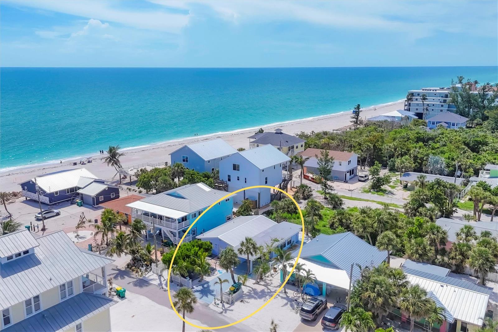 Beachside Bliss – Renovated, Move-In Ready & Loaded with Upgrades! Just three houses from the shimmering sands and beautiful beaches of Manasota Key, every day will feel like a vacation. This chic, ultra-charming 2BR/2BA with a versatile Florida Room perfect for extra guests, a home office, or simply relaxing after a day at the beach, is a rare find—a coastal retreat that's turn-key and perfectly poised as a vacation getaway, year-round residence, or income-generating short-term rental—packed with updates and designed for fun in the sun. Imagine sipping your morning coffee with a view of the Gulf, swaying in a hammock beneath a shady canopy of trees, and listening to the sounds of the waves lull you to sleep at night... This is it - you've found your slice of paradise! Step inside to a sunny, open-concept floor plan that lifts your spirits and flows seamlessly from the living area to the dining area, and on to a BRAND NEW quartz-topped chef’s kitchen featuring solid wood shaker cabinets, quartz countertops, stainless steel appliances (refrigerator, convection air-fry oven, smart microwave, dishwasher). NEWER Metal roof (2021) with brand-NEW gutters and downspouts. NEW Green HVAC system with hurricane-rated condenser on raised platform (qualifies for a tax credit), NEW Ductwork, NEW plumbing throughout: NEW hot water heater, NEW toilets, NEW vanities and sinks, NEW kitchen sink and fixtures. The interior oversized laundry/utility room with NEW sink and vanity features a NEW washer and dryer, and an abundance of extra bonus storage space, including NEW shelving. All-NEW electrical panel and circuits, disconnect and wiring to panel, NEW outlets/outlet covers, NEW light fixtures, NEW energy-efficient ceiling fans, NEW lighting indoors and outdoors, including motion-sensor porch light. NEW insulation, NEW interior walls/drywall finish, NEW interior paint on walls/ceilings, NEW interior floor and wall custom shaker trim and moulding throughout the entire home, NEW interior doors, NEW closet shelving, NEW exterior doors, NEW hardware on all interior and exterior doors, NEW shiplap accent wall in Florida Room, Flooring refreshed with professional cleaning, buffing, re-color grouting, and sealing. The Outdoors is an Oasis featuring multiple decks and patios, including a shaded front hammock patio, a carport, and a deck for sunset cocktails. NEW outdoor shower with hot/cold—rainforest and handheld, NEW outdoor spigots and hoses, NEW Exterior Painting of Entire Home and Trimwork, NEWLY painted Carport, Driveway, Back Deck, and Outdoor Shower Platform (with "heavy shield" driveway/concrete paint), NEW Zero-maintenance crushed shells, NEW Mailbox, NEW Hammock, New Berm Guard Carport. City water/sewer. Walk-to restaurants for fresh seafood, happy hour, and live music, along with quick access to boating, kayaking, or dolphin-spotting adventures. This home is perfectly positioned for a relaxed coastal lifestyle or strong short-term rental returns in a sought-after location. Unpack your swimsuit, hit the beach, and let this bungalow pay for itself! Don’t miss your chance to own your own piece of Manasota Key paradise! Whether you’re seeking a personal coastal haven, a turnkey vacation home, or an income-producing investment with prior rental history, this gem checks every box. Paradise is calling—this home is your ticket to the Florida lifestyle you deserve. Don’t wait—homes this close to the water, and this beautifully updated, are rare!