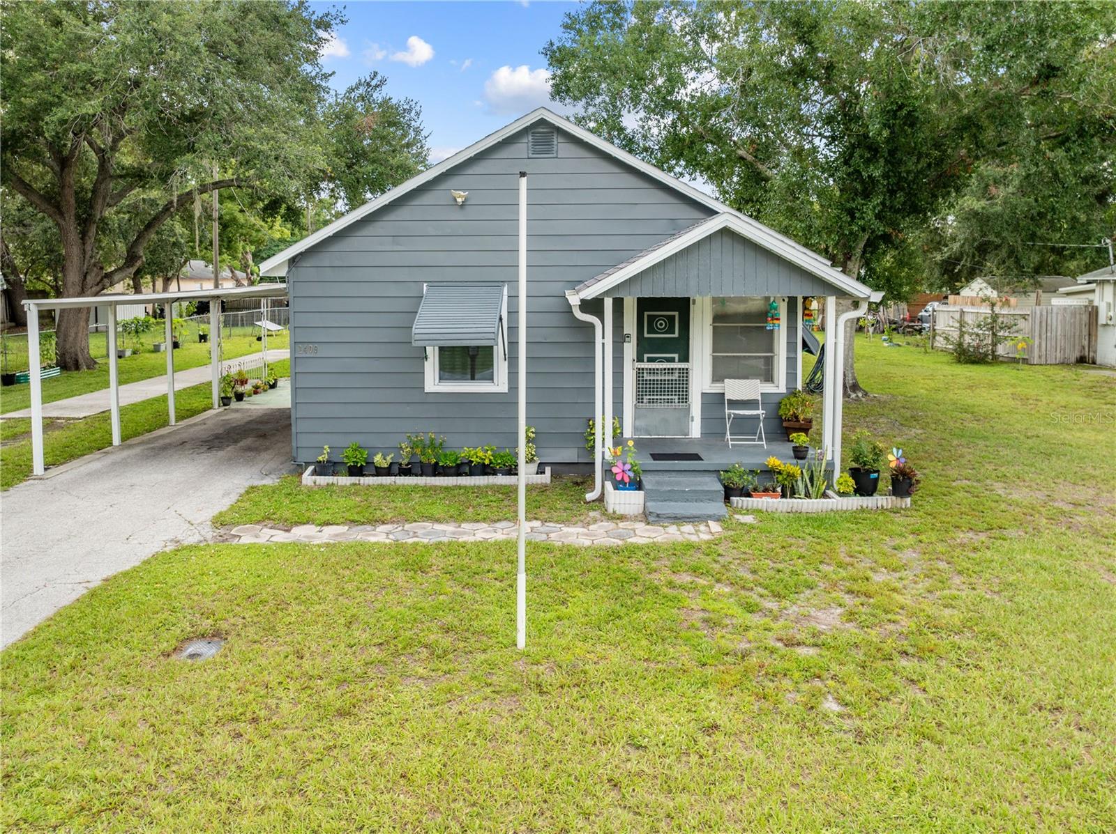 Welcome Home to This Beautifully Updated 3BR/2.5BA Home on a Spacious 0.34-Acre Lot! Located in the heart of St. Cloud, this move-in-ready home boasts an 800 sq ft addition completed in 2024, offering extra space and modern comfort. With a Smart Home setup, EV charger, and energy-efficient mini-split HVAC system (4-head main home, 2-head addition), this property blends convenience with sustainability. Enjoy an open-concept floor plan that seamlessly connects the living, dining, and kitchen areas. The kitchen features stainless steel, WiFi-enabled appliances, making everyday living both stylish and smart. The primary bedroom includes a walk-in closet and a private ensuite bath with direct access to the screened lanai—an ideal spot to unwind. Two generously sized guest bedrooms provide ample space, with one featuring a private entry to the half bath—perfect for guests or a home office setup. No HOA/CDD fees and not in a floozone. Plenty of space for your boat, RV, golf cart, or other toys. Conveniently located near shopping, dining, schools and major roadways to Orlando and Melbourne. Don't miss your chance to own this upgraded gem with space, style, and smart features galore!