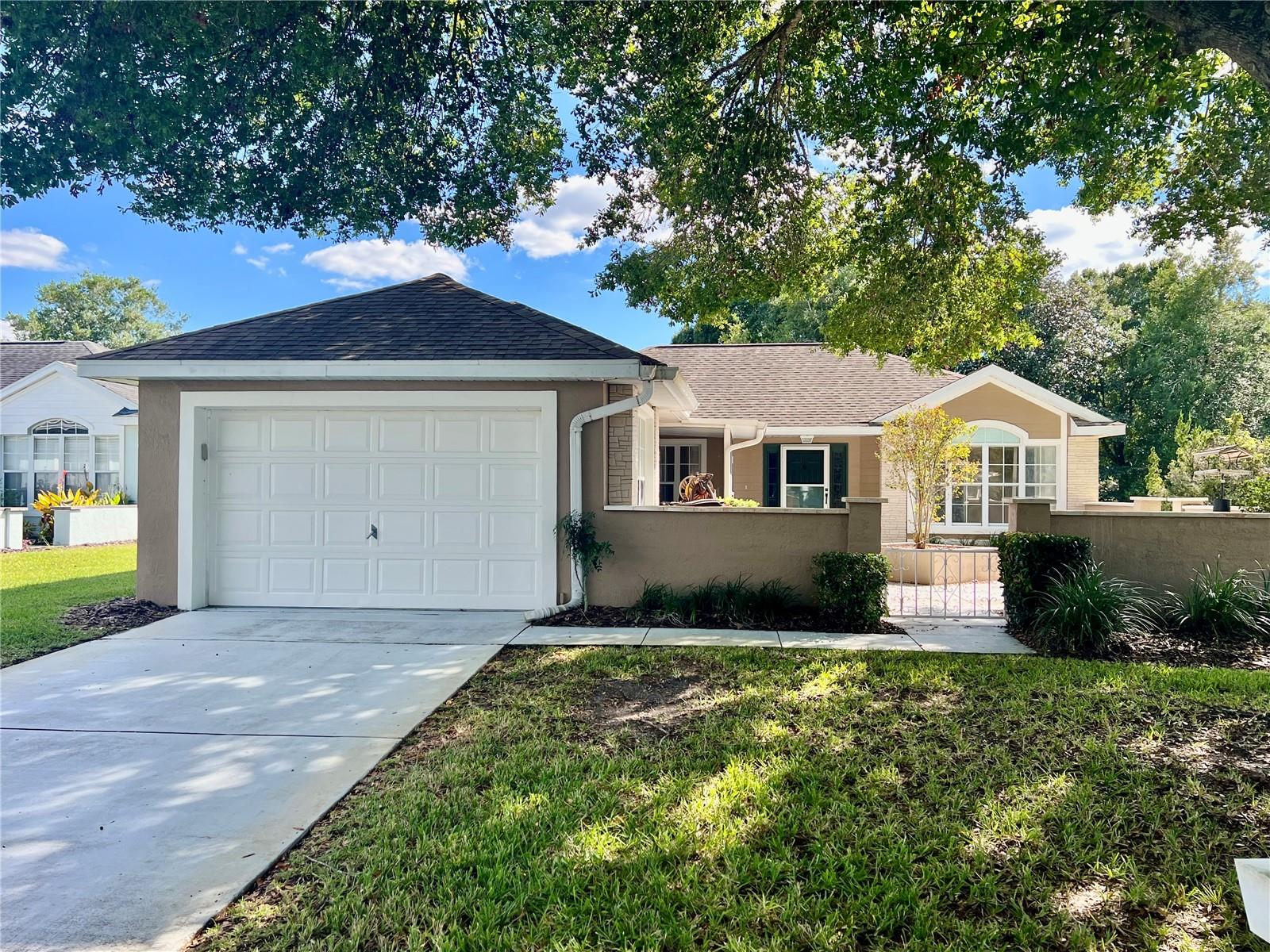 Escape to sunny Florida and enjoy the good life in this charming Essex model, perfectly located in the highly desirable 55+ community of Oak Run! This home features a welcoming courtyard in the front and a screened-in porch to relax and unwind in the evening breeze. Step inside to beautiful wood laminate flooring throughout the main living areas. The split-bedroom layout offers privacy and comfort, with a spacious master suite featuring a walk-in closet, soaking tub, and separate shower. The landlord covers the association fee, so you get full access to all the amenities with no extra cost. Why shovel snow when you can live where others vacation?