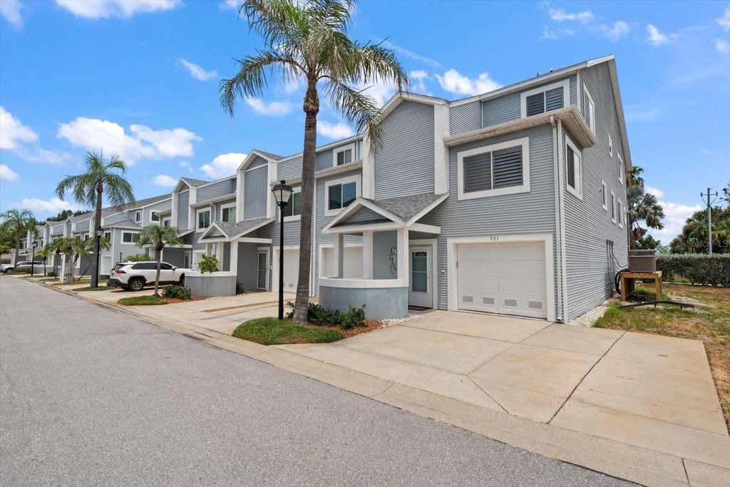 Photo of 901 Harbour House Drive, Indian Rocks Beach, FL 33785 (MLS # TB8527032)