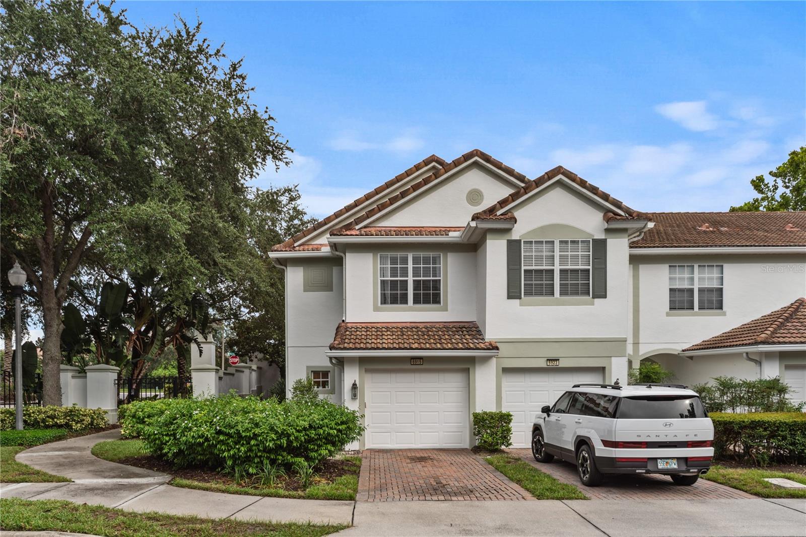 Stunning End Unit Townhome in the Heart of Dr. Phillips!
Fall in love with this immaculate and upgraded end unit townhouse, perfectly situated in the highly sought-after gated community of Phillips Commons. Just minutes from Restaurant Row, top-rated schools, Dr. Phillips Hospital, world-class attractions, and major highways, this location offers unbeatable convenience and lifestyle.
Step inside to rich wood flooring, luxurious granite countertops, premium stainless steel appliances, and elegant solid wood cabinetry. The open-concept kitchen and family room create a warm, inviting space for both relaxing and entertaining. Enjoy your morning coffee or evening wind-down in the private screened lanai, nestled on a serene corner lot.
Upstairs, you'll find spacious bedrooms with generous closet space. And best of all? You're just a short stroll from the community pool and clubhouse. This is more than a home it's the lifestyle you've been waiting for. Don’t miss your chance to own this gem!