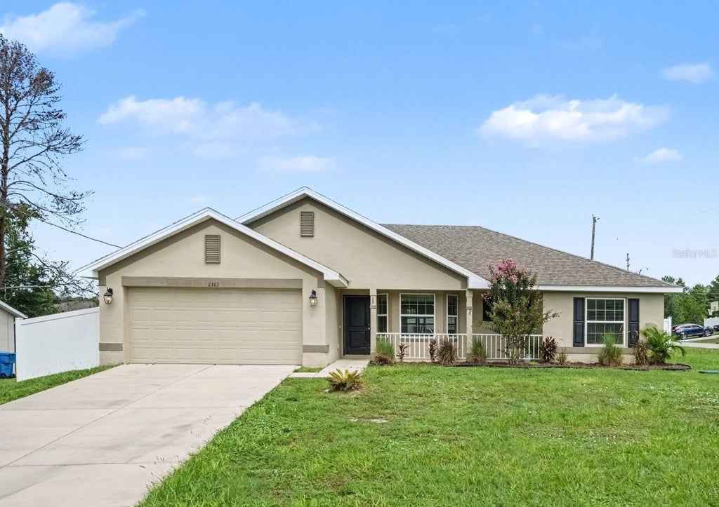 Photo of 2363 Ring Road, Spring Hill, FL 34609 (MLS # O6443002)