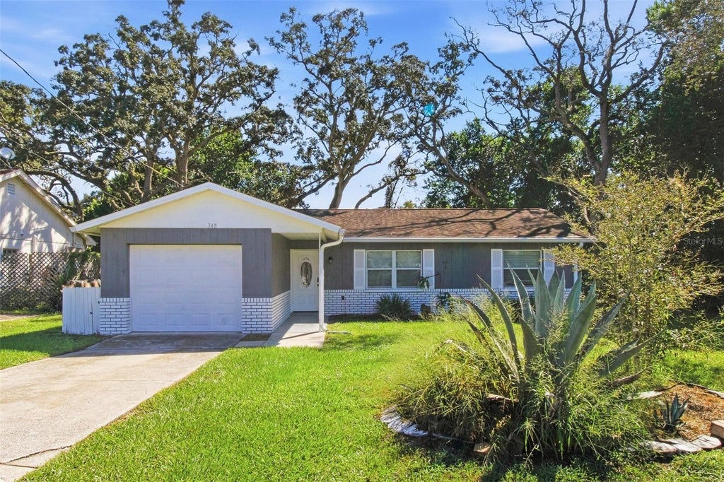 Photo of 348 Hartwood Avenue, Spring Hill, FL 34606 (MLS # O6446748)
