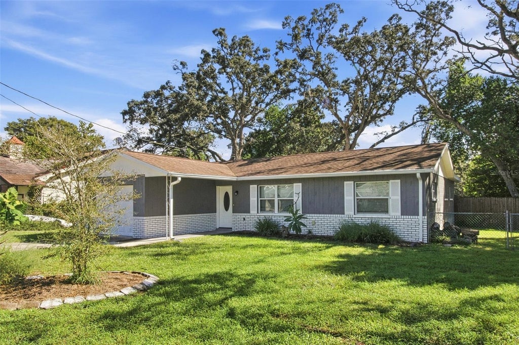 Photo of 348 Hartwood Avenue, Spring Hill, FL 34606 (MLS # O6446748)
